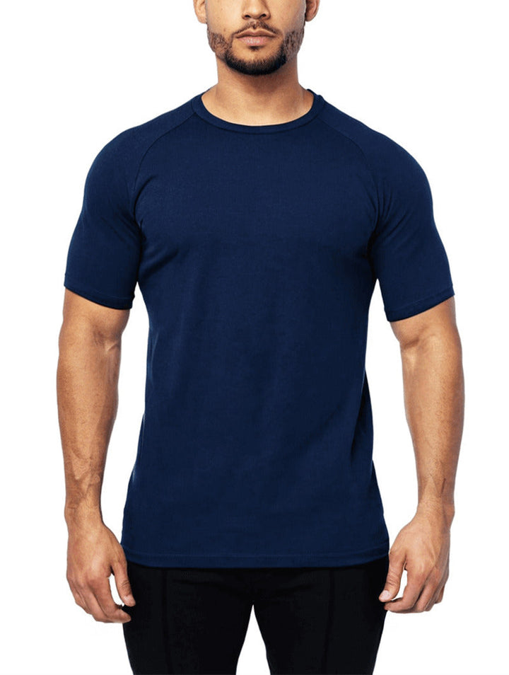 Man wearing a Aleano navy blue t-shirt on a white background